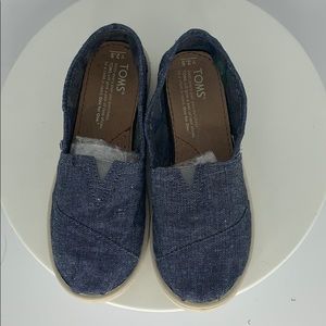 Denim Tom’s slip ons